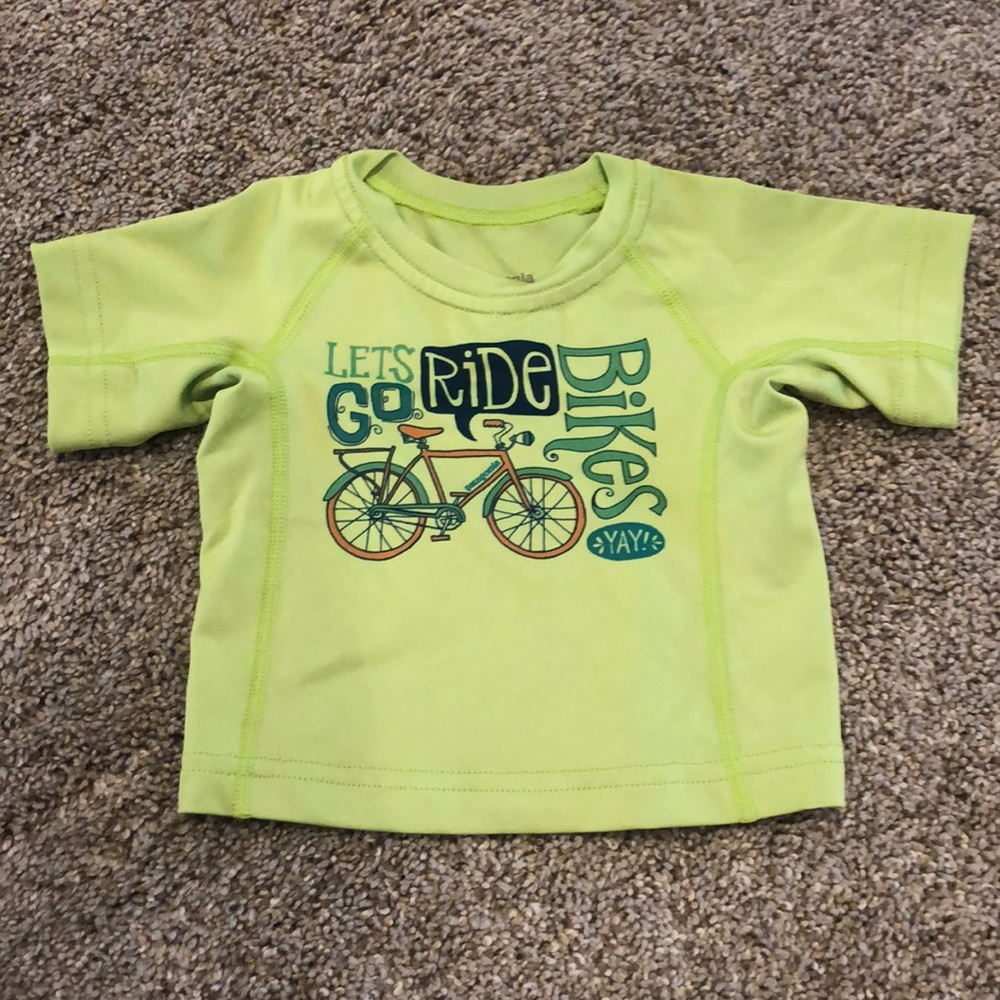 Newborn Patagonia athletic bike short sleeve shirt
